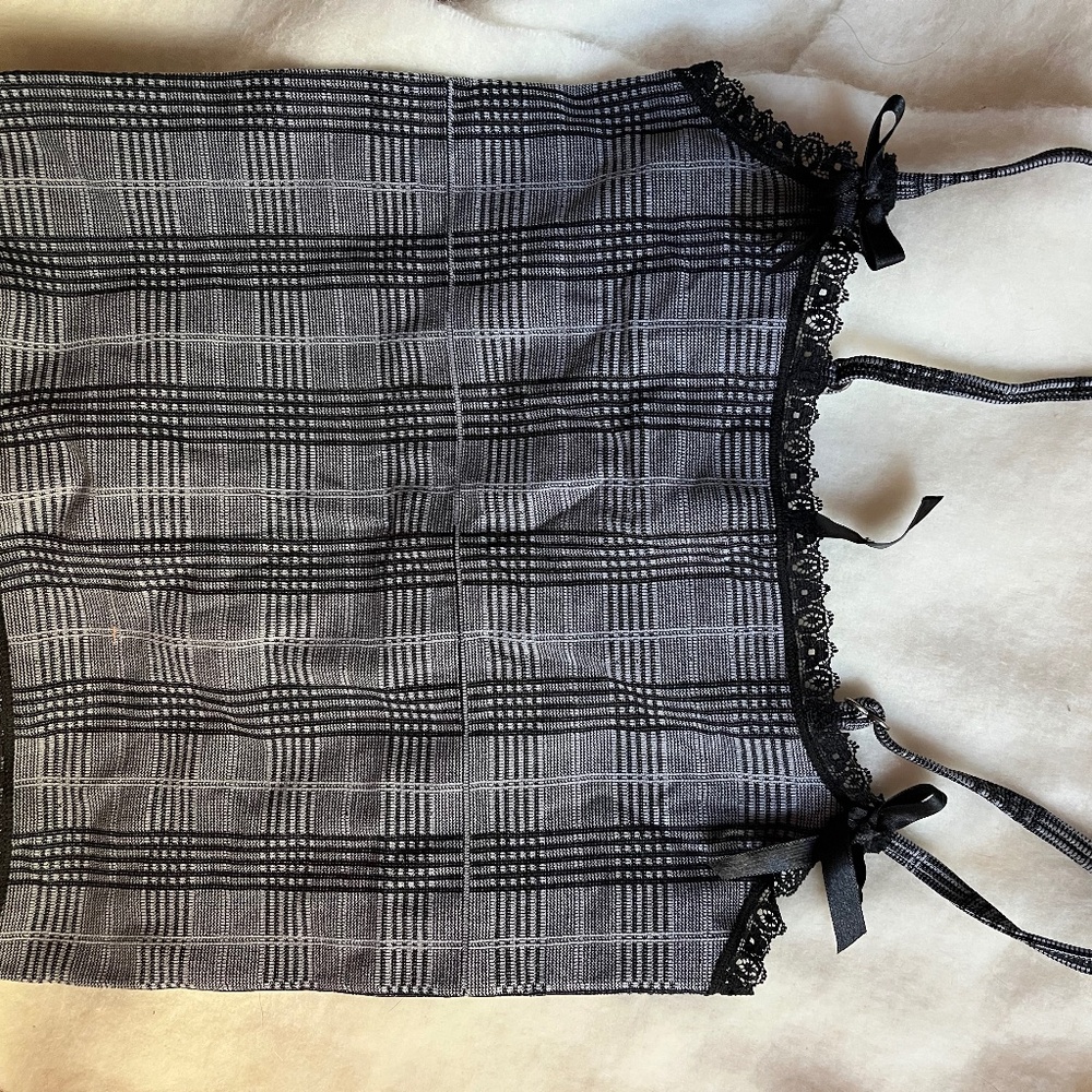Urban Outfitters out from under edgy thank top